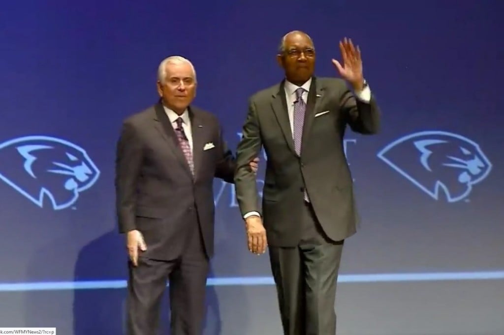 Tubby Smith (right) is introduced as men's basketball coach at High Point University on March 27