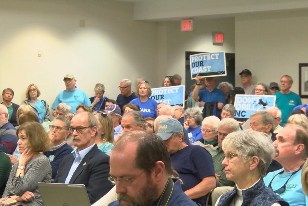 Supporters and opponents of offshore drilling fill the Brunswick County Commission meeting on March 20