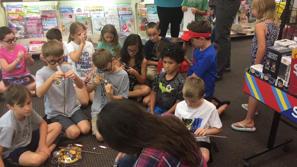 Kids make magic wands during a Harry Potter 20th anniversary celebration at Books-A-Million in Wilmington in July 28