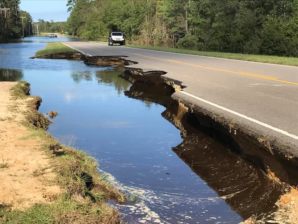 A portion of NC Highway 210 near  Moore's Creek Bridge is partially collapsed and washed out in parts due to flooding from Hurricane Florence. (Photo source: Moore's Creek National Battlefield)