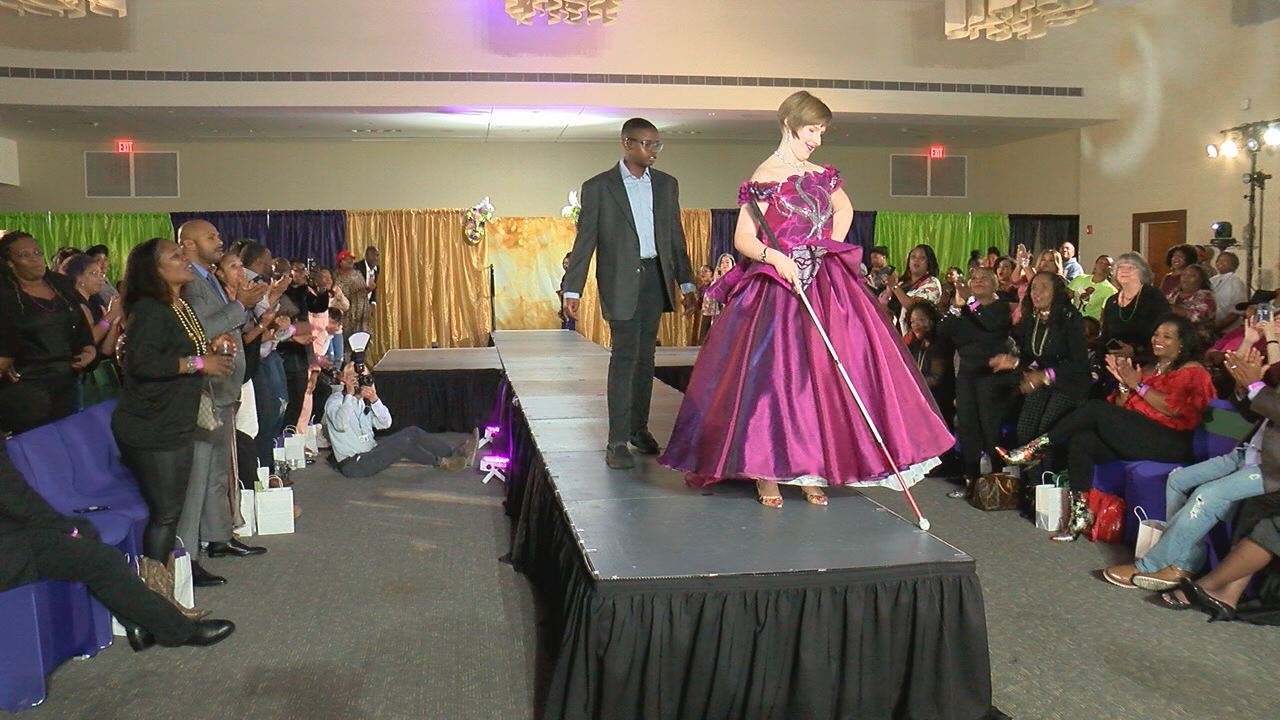 Models on the runway at Port City Rip the Runway