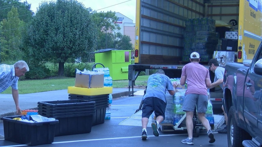 Relief supplies being loaded into a truck