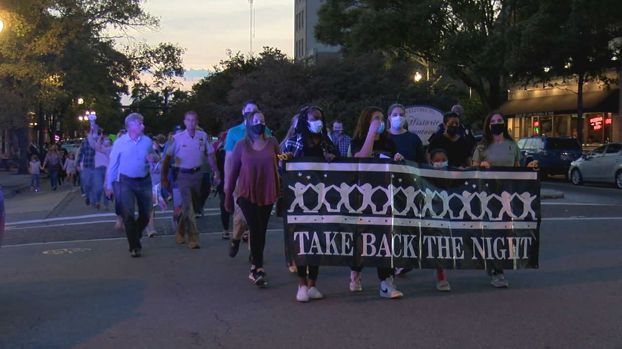 Domestic violence survivors and their supporters 'Take Back the Night ...