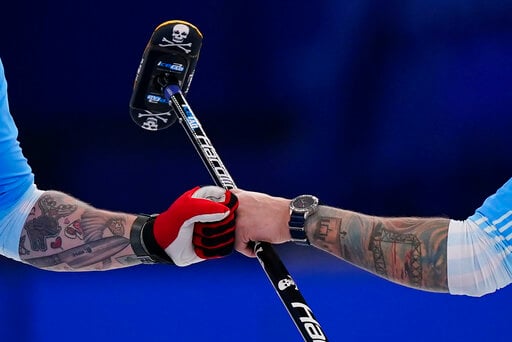 Glimpses: A Rare Look At Tattooed Flesh On The Olympic Ice
