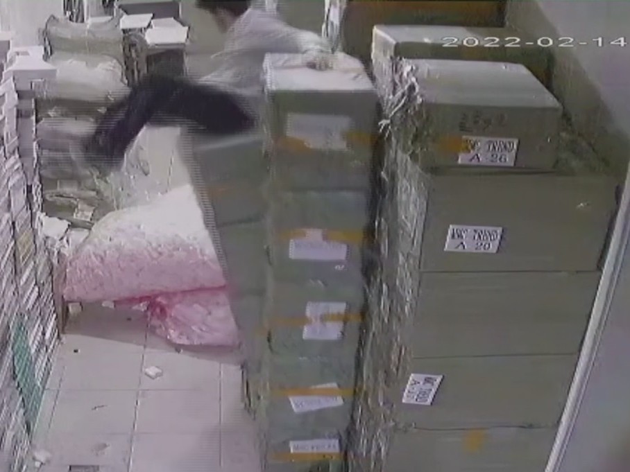 CAUGHT ON CAMERA: Boxes break fall after boy steps through opening in ...