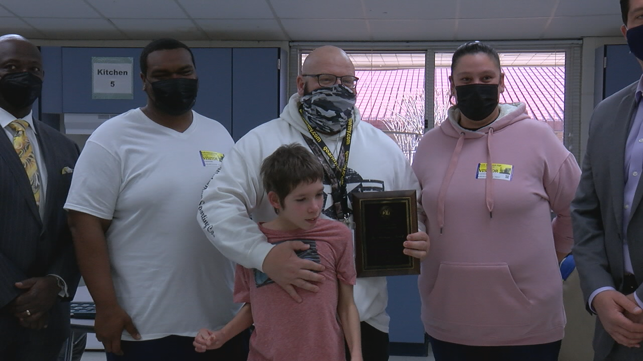 Teacher surprised with award after saving student's life - WWAYTV3