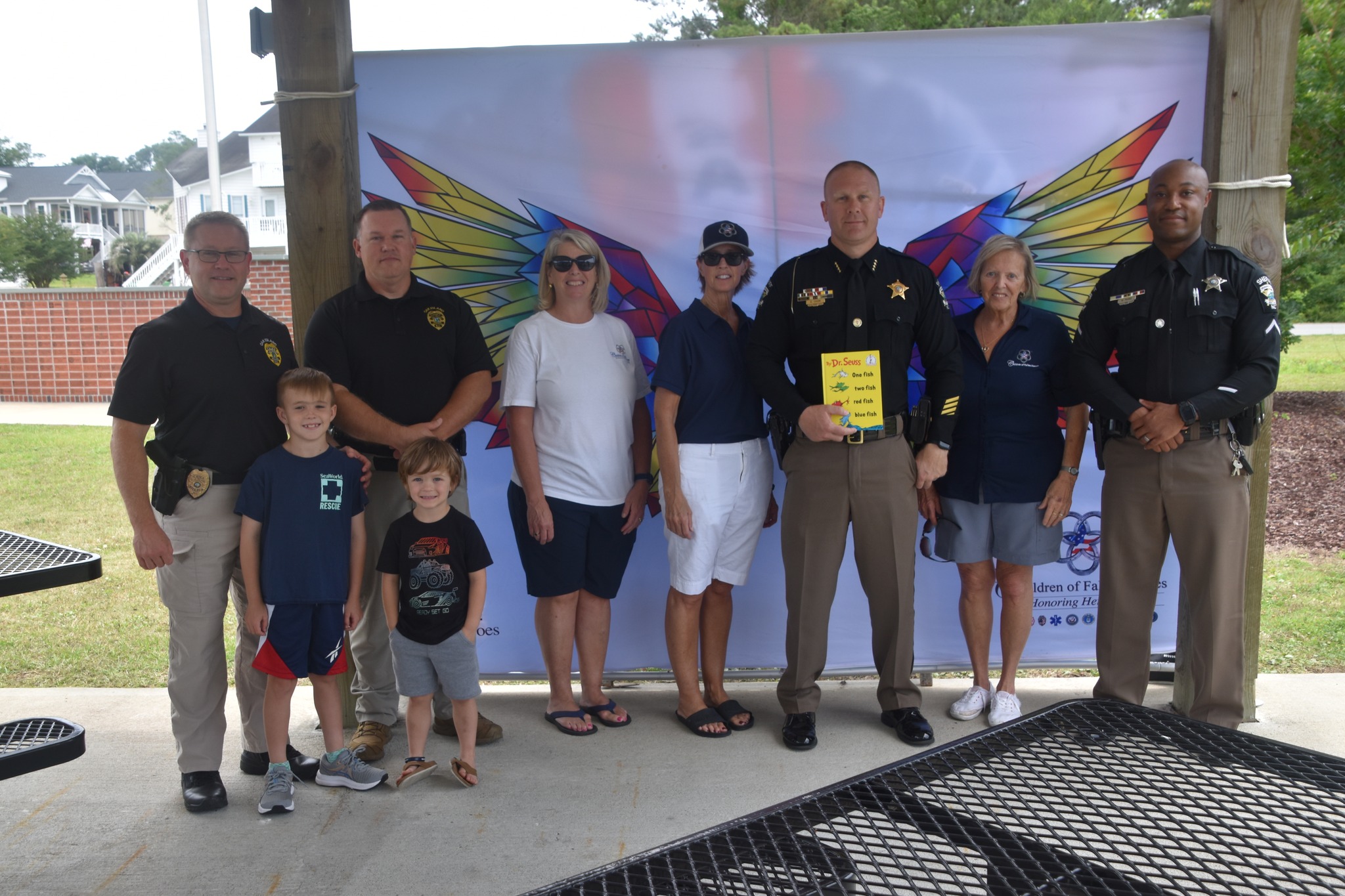 Oak Island, Brunswick County officers participate in Badges and Books event - Vimarsana News