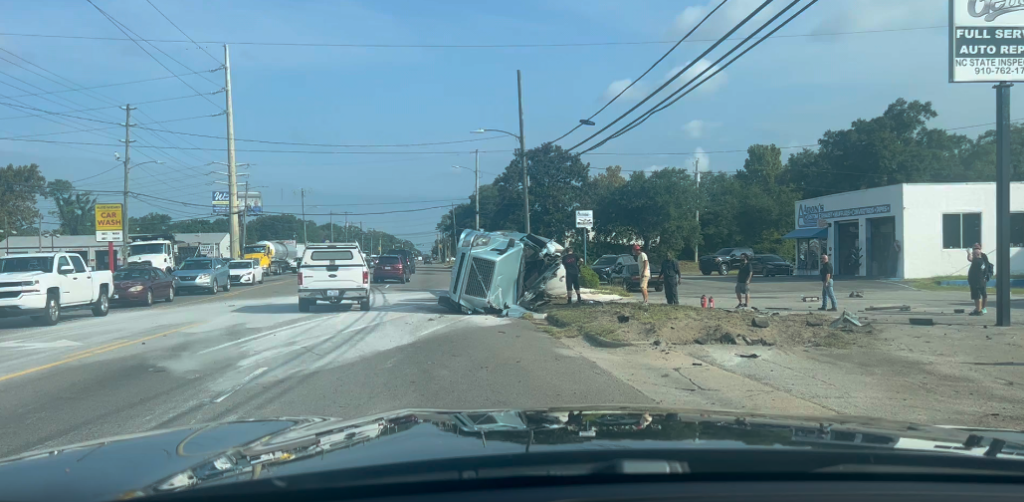 Semi trailer overturns on Carolina Beach road leading to road