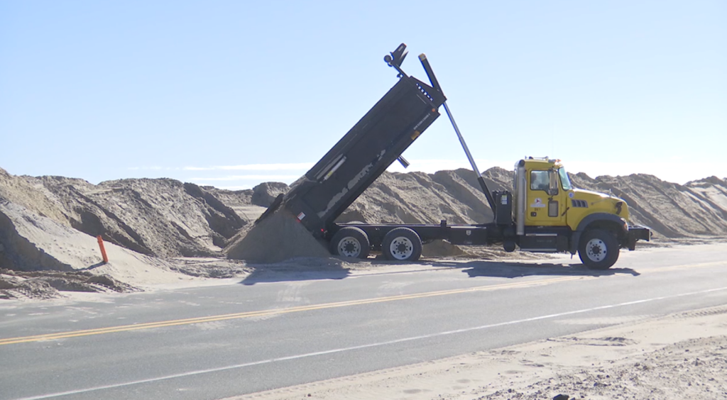 Crews work to prepare for impacts of sea level rise on the Outer Banks.