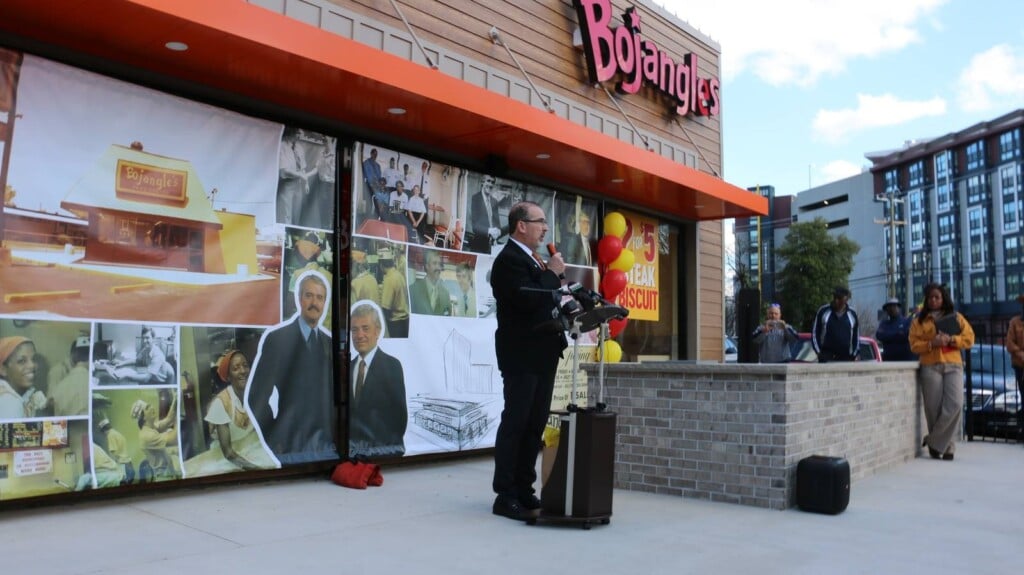 Jose Armario speaks in front of the original Bojangles reopening.