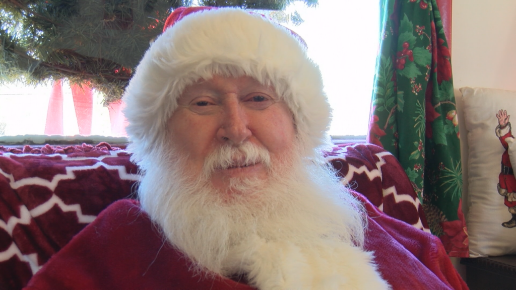 Dwight Burleson, also known as Mr. B, is one of Santa's honorary helpers, (Photo: Emily Andrews/WWAY News).