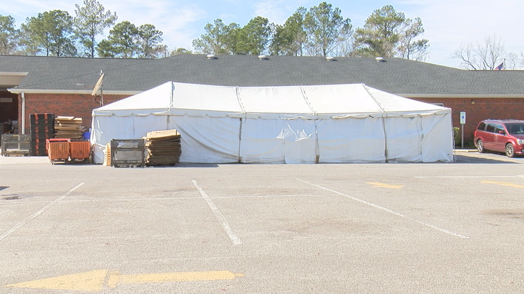 Postal workers in Leland have been sorting mail out of a tent adjacent to the local post office for seven years, according to a letter carrier who operates from the Leland Post Office. (Photo:Marion Caldwell/WWAY News)