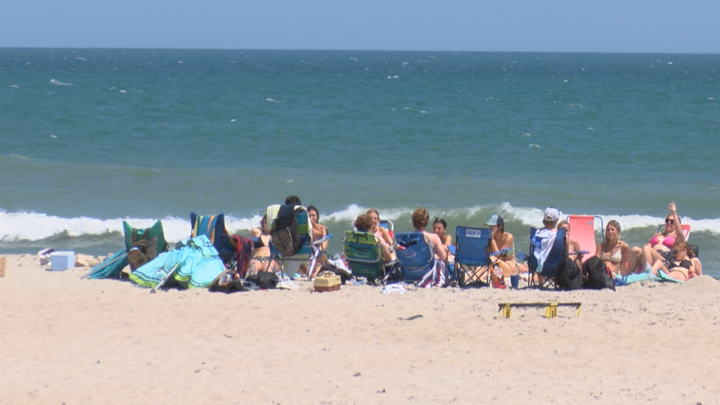 Temperatures were in the high 70’s on Monday and lots of folks took advantage of the warm weather at Wrightsville Beach, (Photo: Emily Andrews/WWAY News).