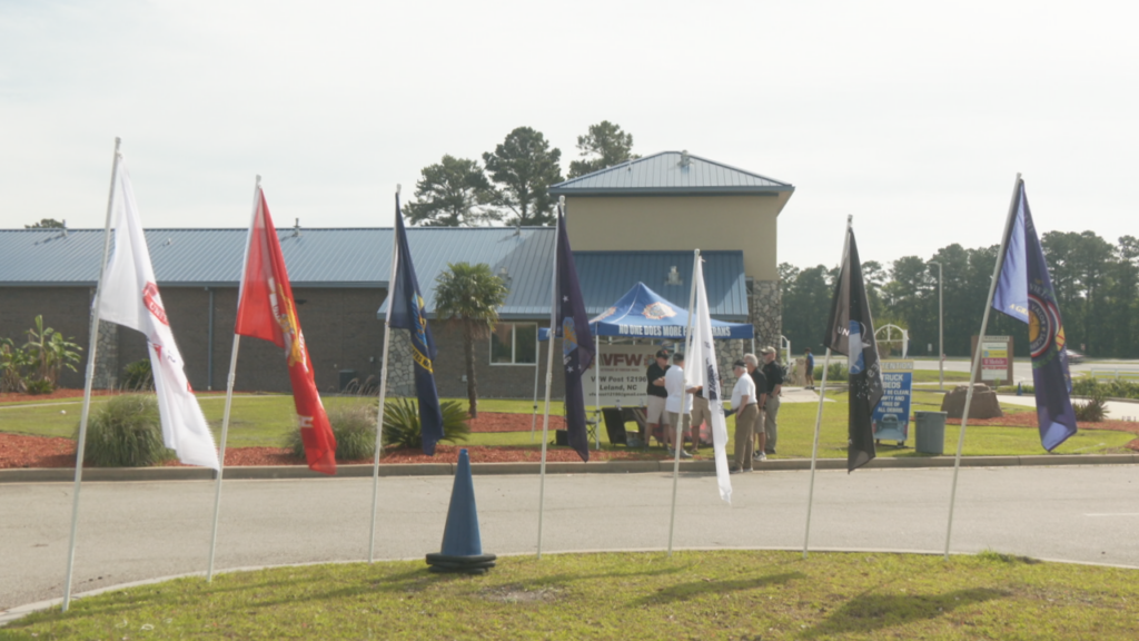 On Saturday, Veterans of Foreign Wars Post 12196 pitching up tents around Leland to collect donations and give out Buddy Poppys (Photo:Nate Mauldin/WWAY)