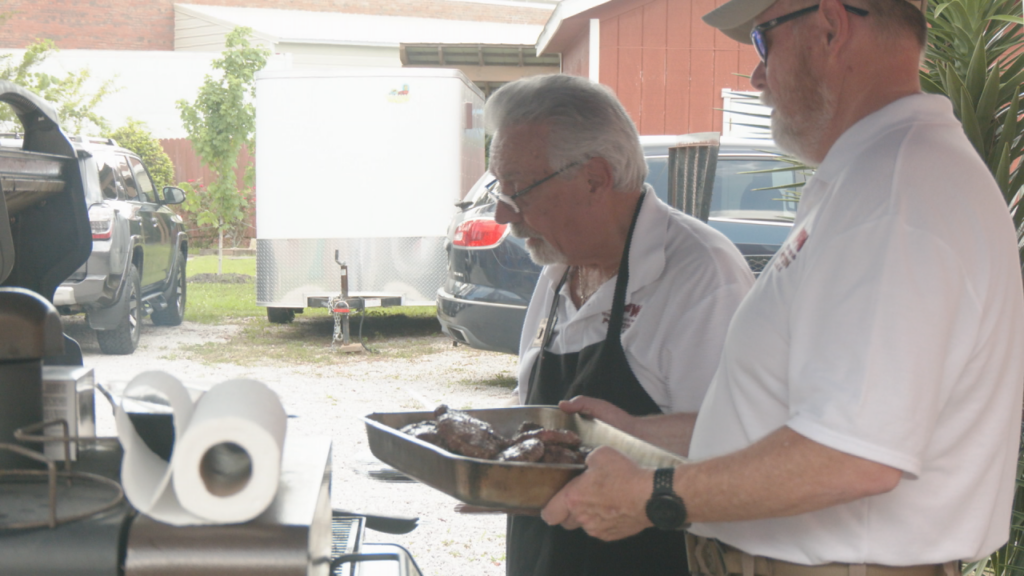 VFW Post 12196 teamed up with Good Shepherd's Sgt. Eugene Ashley Memorial Center in Wilmington on Sunday to provide hotdogs, steaks, wings, and hamburgers to homeless veterans. (Photo:Nate Mauldin/WWAY)