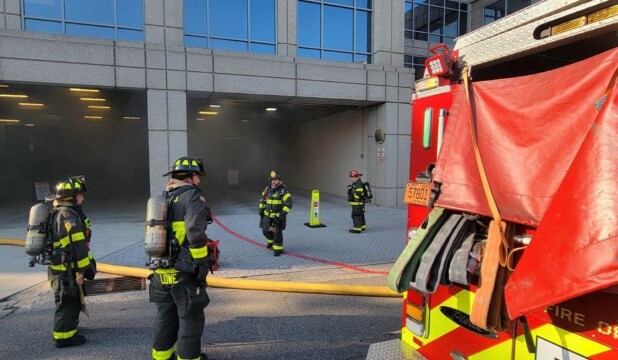 Firefighters respond to vehicle fire in the Skyline Center parking deck ...