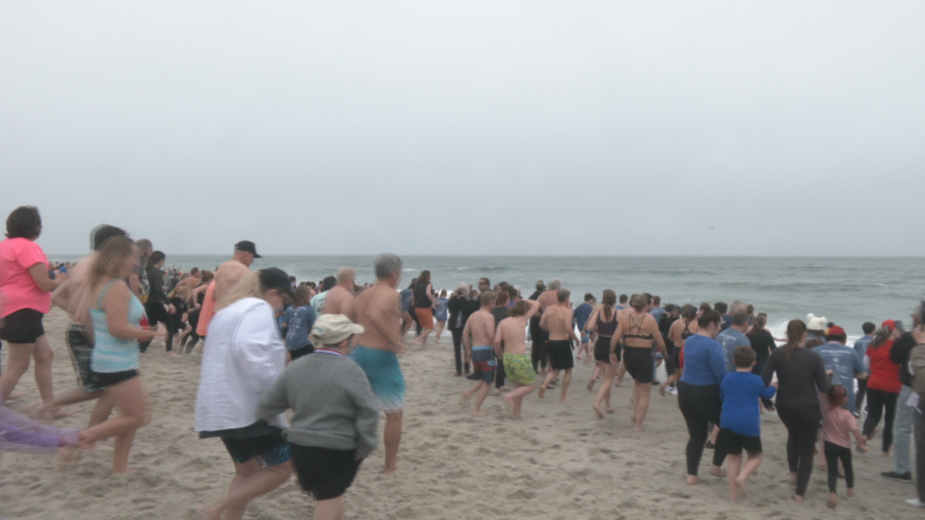 Hundreds of participants with the annual Special Olympics Polar Plunge brave the cold waters of Kure Beach on February 8, 2024. (Photo: Nate Mauldin/WWAY)