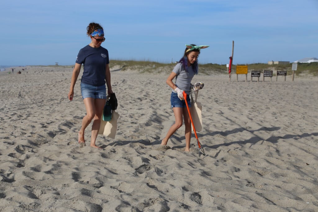 Yoda Ears Beach Cleanup Young Girl And Mother Press Release