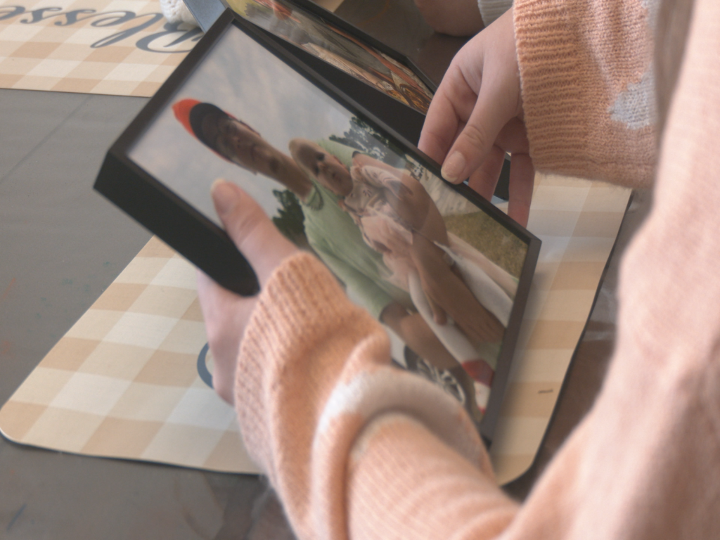 Family looks at picture of Seth Condrey, who passed away