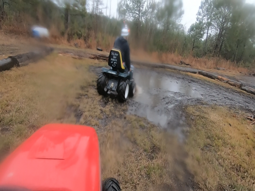 WWAY's Bryan Alonso racing at a lawn mower mud track