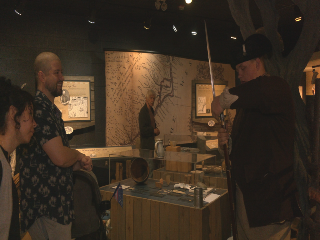 History interpreter teaching about the Stamp Act