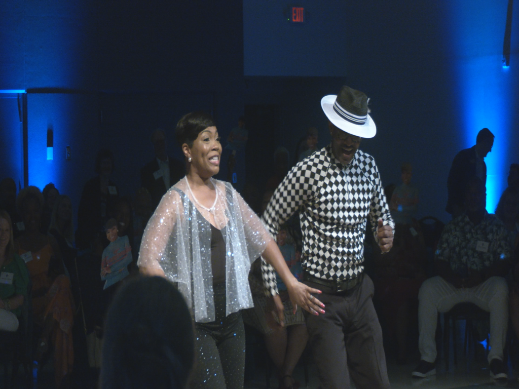 WWAY'S Tomika Jackson performing at the "Dancing with the Seahawks" Event