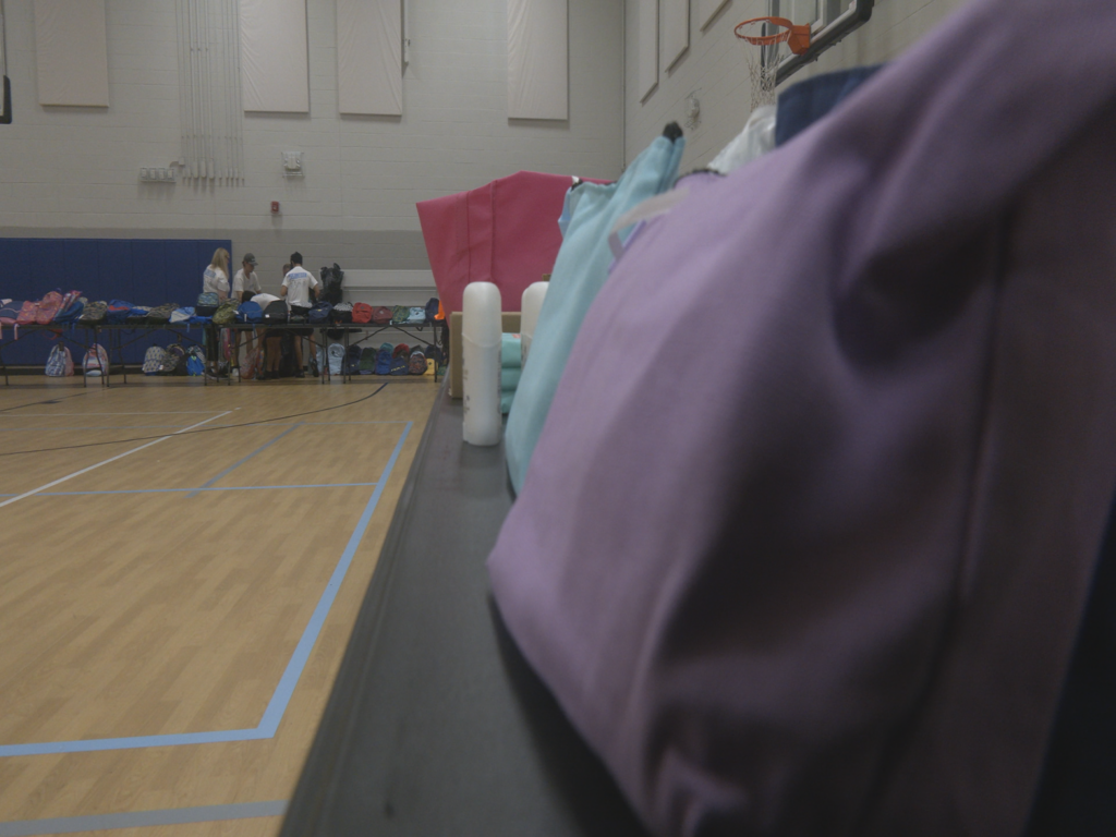 Rows of backpacks at local back to school giveaway in Wilmington