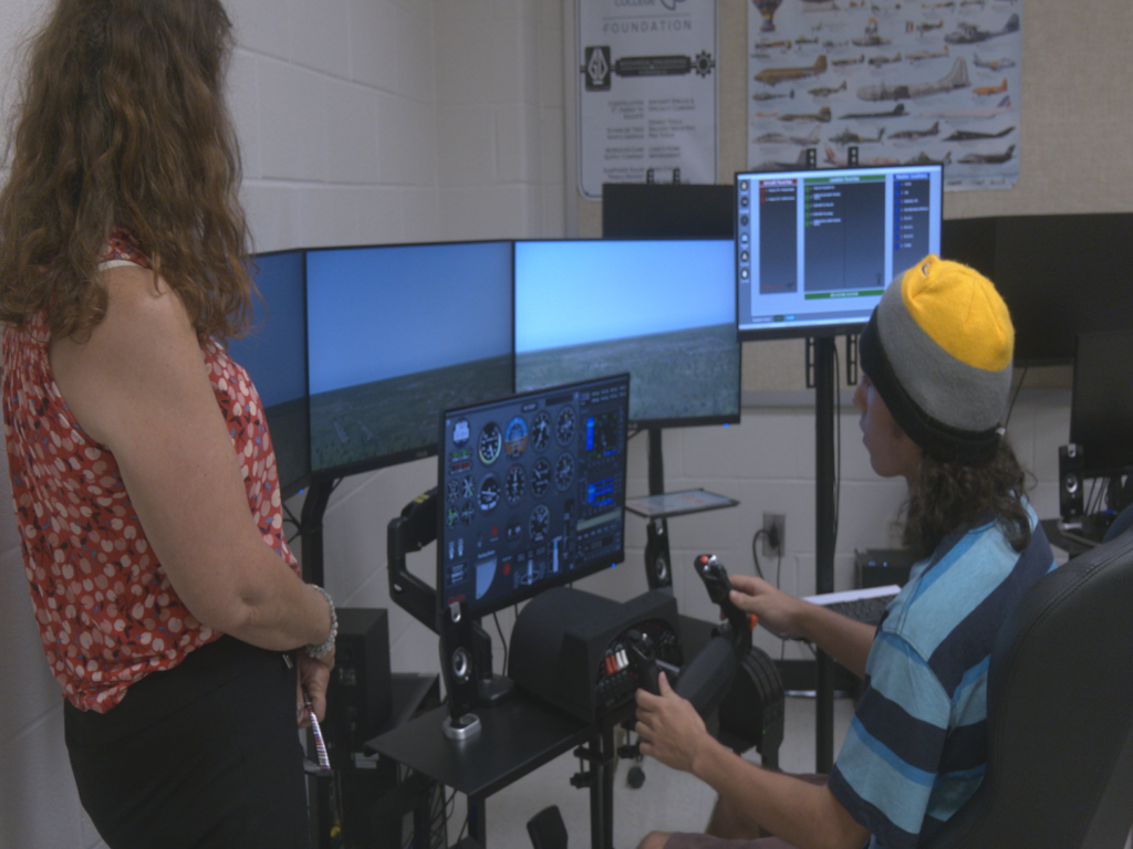 CFCC Students learning how to fly with flight simulator
