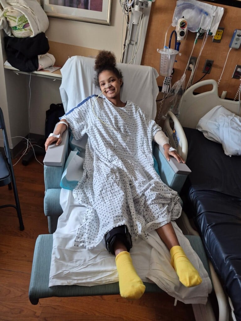 Aniya Moore recovering in the hospital after a car crash accident