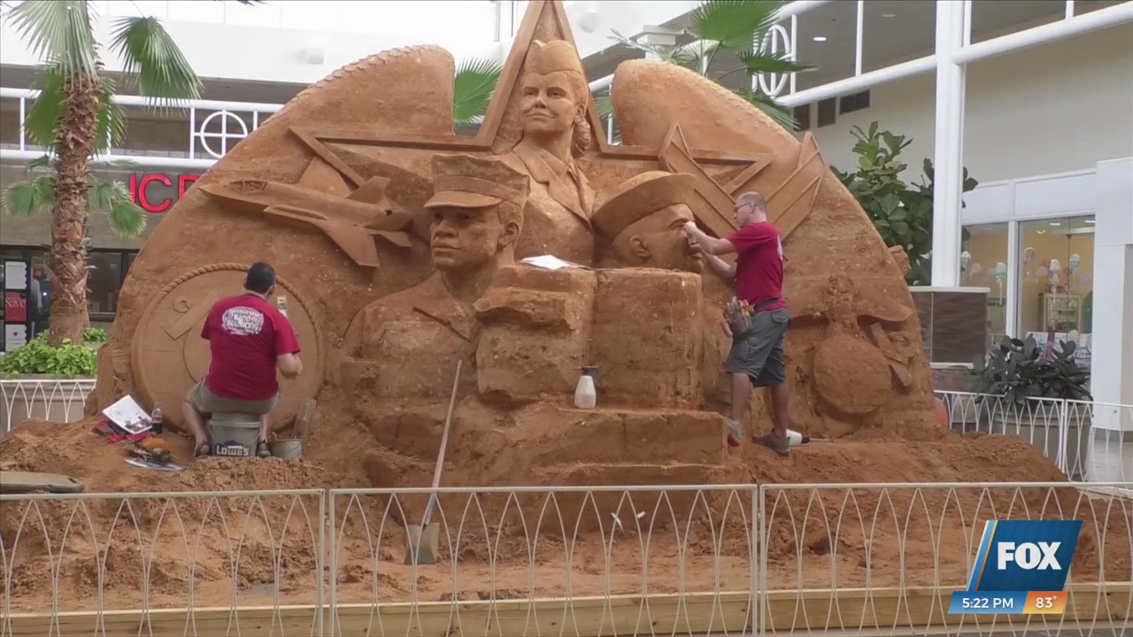 New sand sculpture in Edgewater Mall honors military heroes WXXV News 25