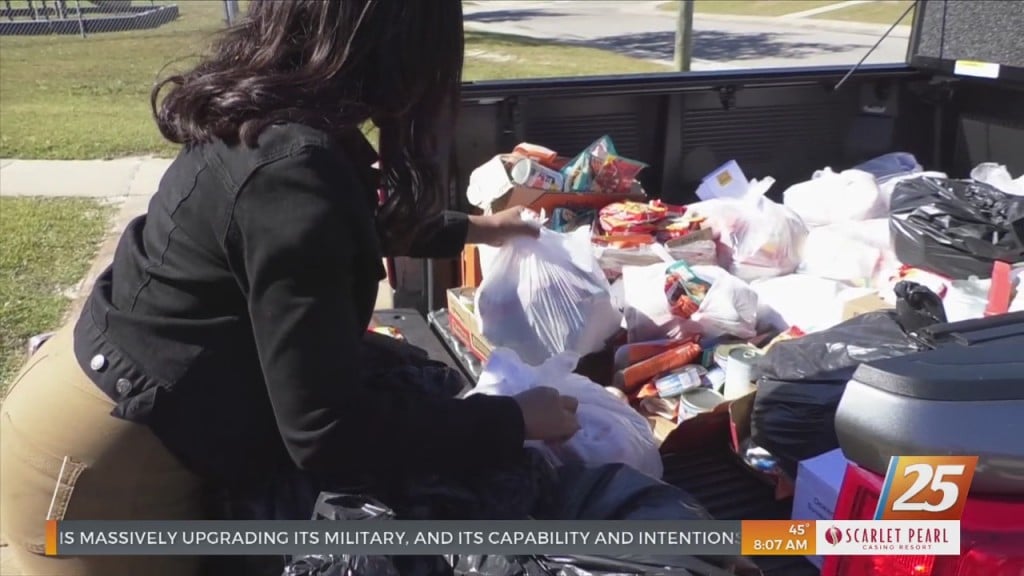 Teens Donate Food To Camille Village Families In Pass Christian