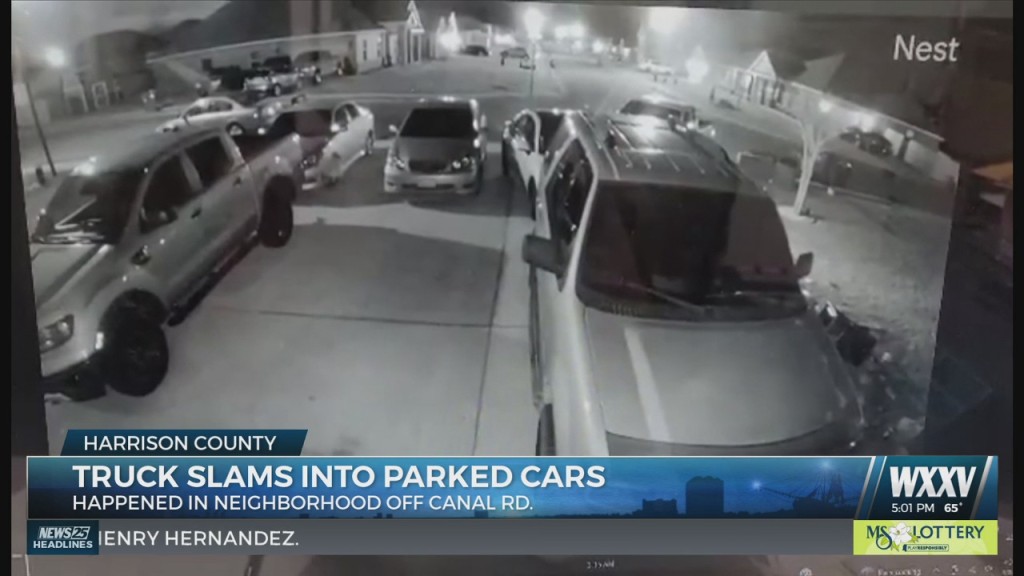 Truck Slams Into Parked Cars