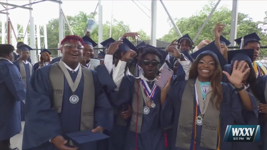 Moss Point High Seniors Take Turns Crossing The Graduation Stage