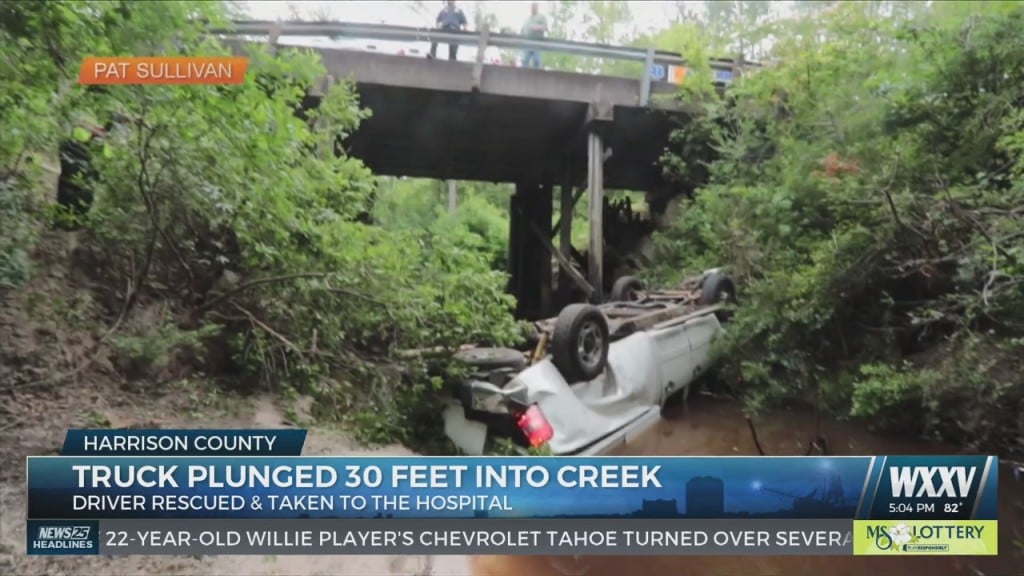 Pickup Hits Bridge, Falls Into Creek