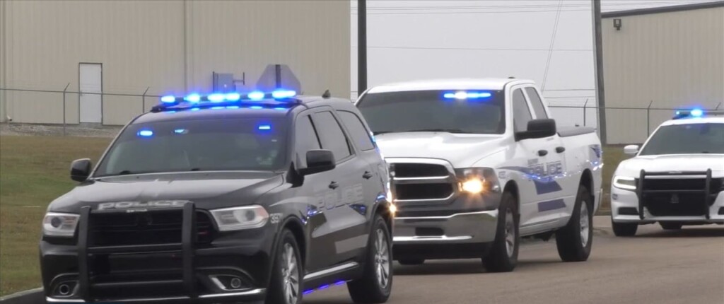 Several Police Departments Escort Fallen Bay St. Louis Officers To Funeral Homes
