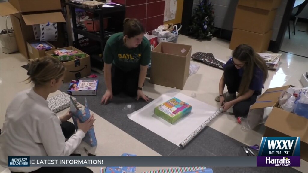 Biloxi High Students Wrap Gifts In Preparation For Project Presents Delivery Day