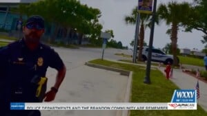Waveland Officer Exchange With Man In Front Of City Hall