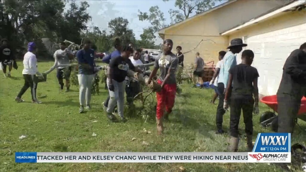 Moss Point Football Team Helps Clean Up Debris
