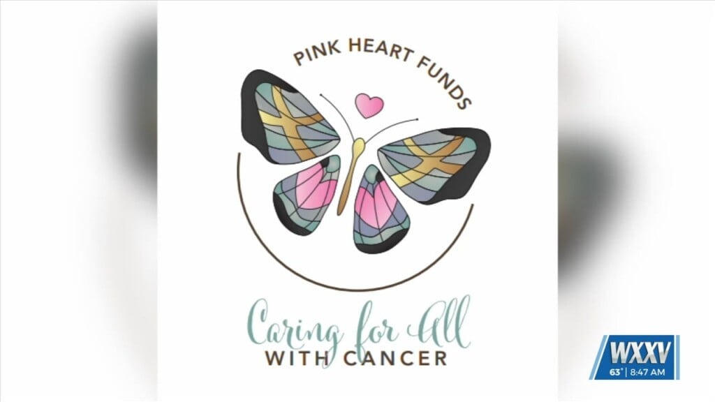 Pink Heart Funds Ribbon Cutting
