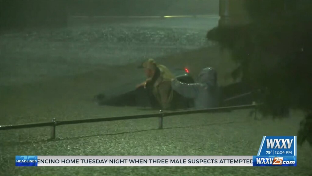 Man Rescues Another Man From Flooded Truck In New Orleans