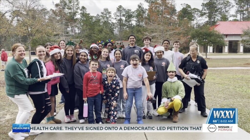 Biloxi Students Deliver Gifts To Families In The Community