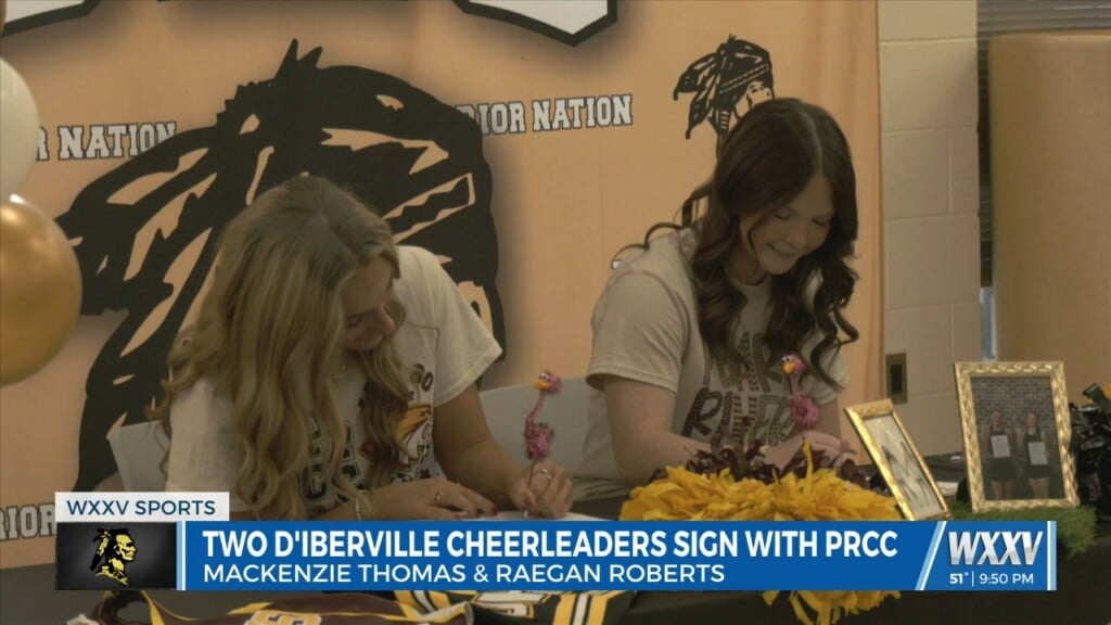 D'iberville High School Cheerleading Duo Signs To Pearl River Community College