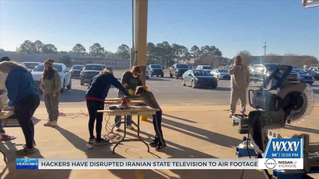 Local Volunteers Build Beds For Children In Need